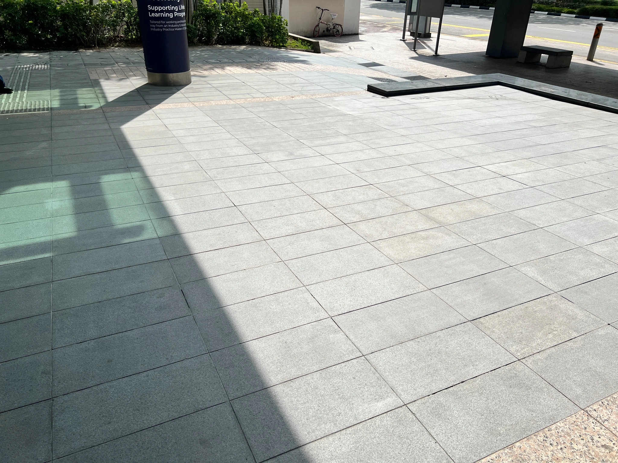 After laser cleaning: restored granite paving at SMU LKC School of Business